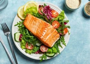 Salmon on a plate with salad