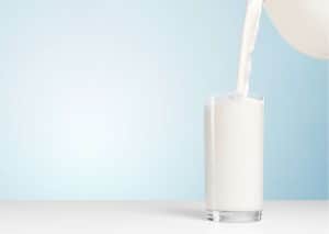 Pouring a glass of milk